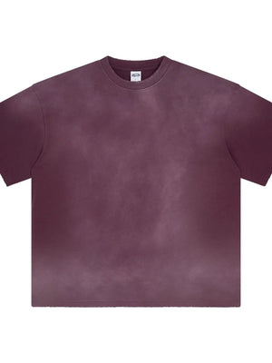Oversized washed cotton crewneck tee in plum purple with a faded, textured look.