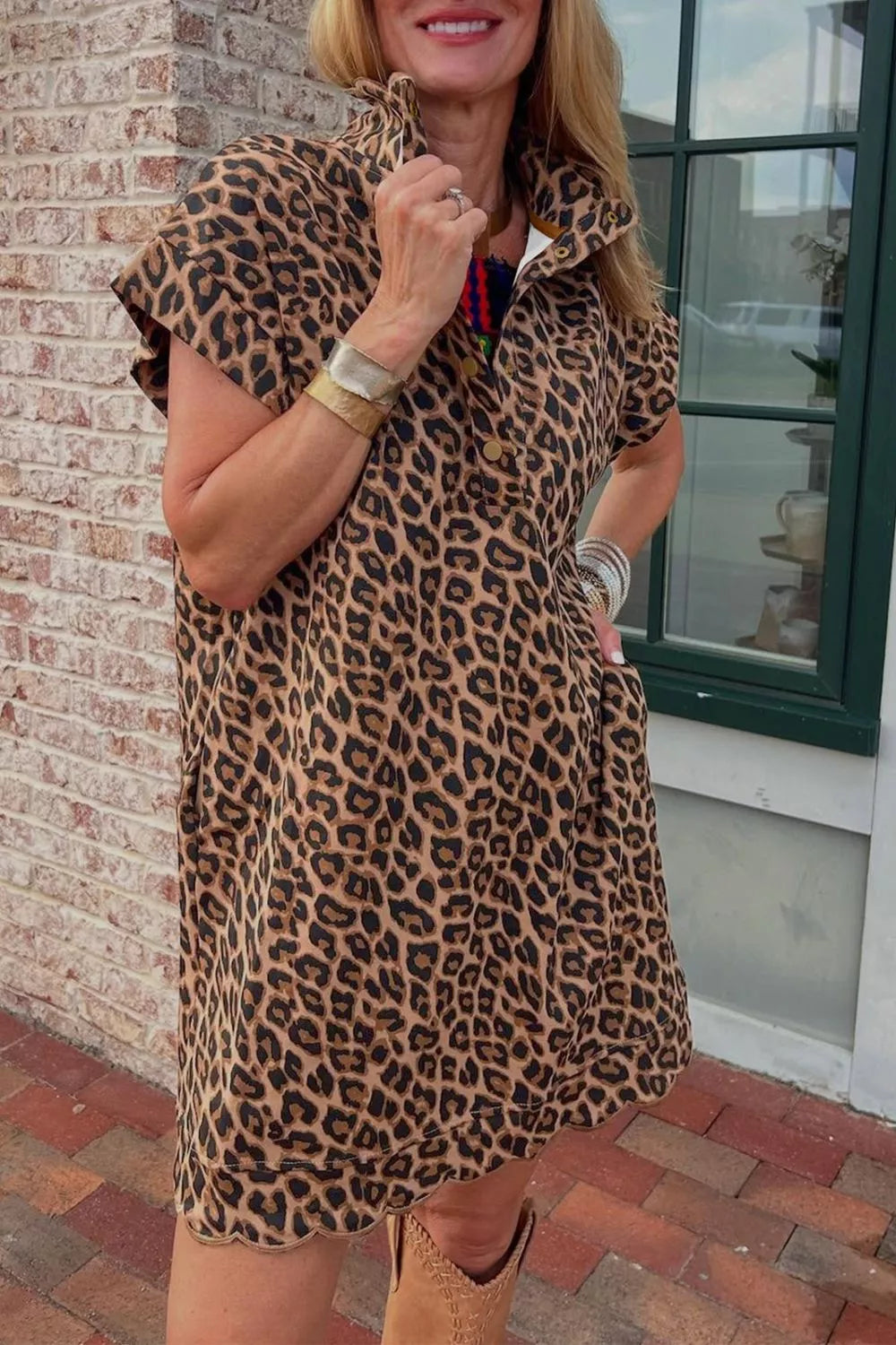 Leopard print short sleeve collared dress with button front and scalloped hem