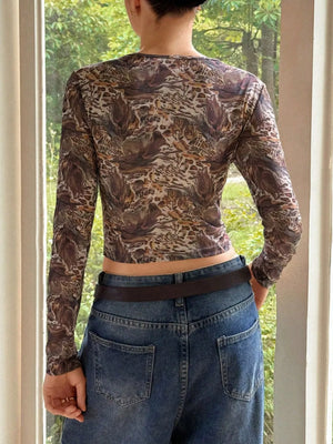 Brown sheer leopard print long-sleeve crop top with a round neckline.