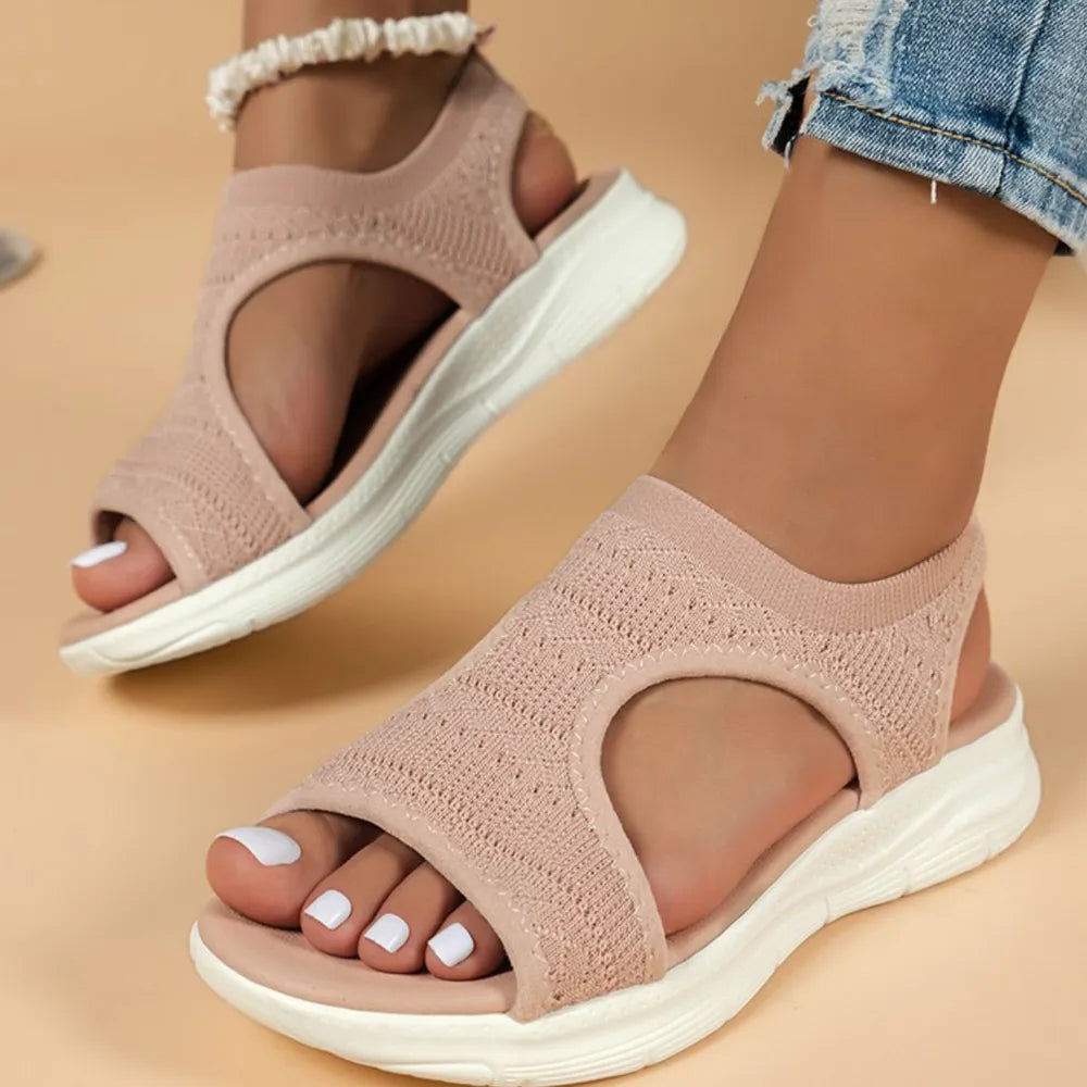 Dusty Pink knit sandals with open toe and white soles, perfect for summer.