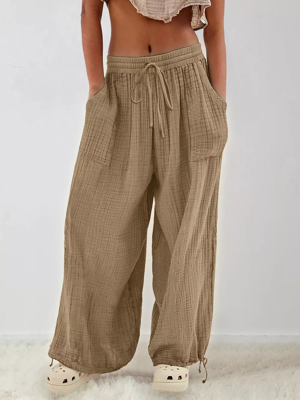 95% polyester, 5% elastane Care instructions: Machine wash cold wide-leg pants in Moss with loose silhouette