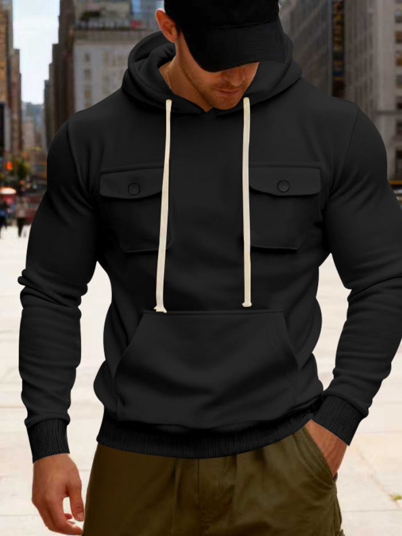 pullover hoodie in black featuring drawstring and regular fit