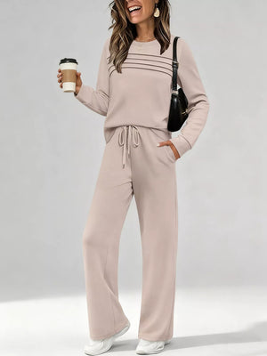Apricot casual long-sleeve top and drawstring pants set with horizontal chest stripes and pockets.