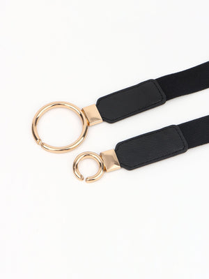 Black elastic belt with interlocked gold rings and black faux leather accents.