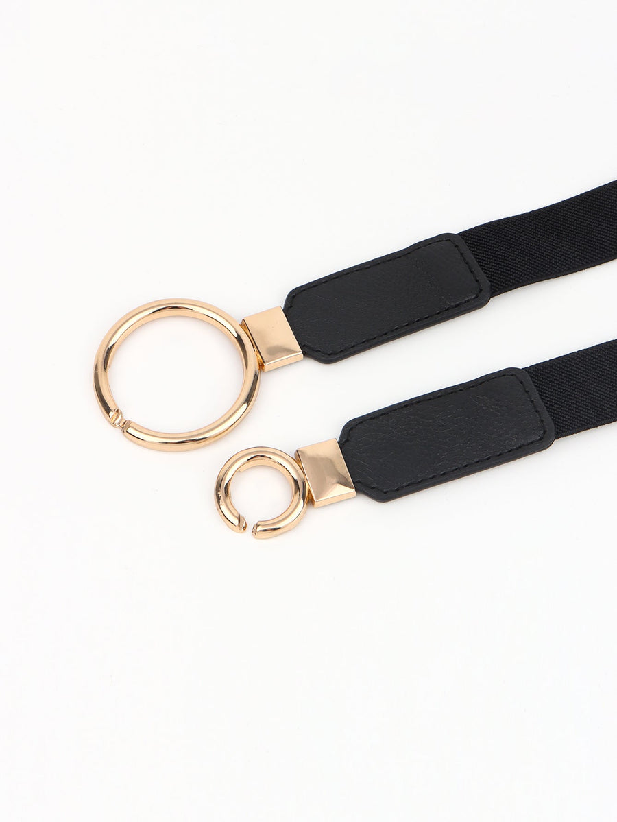 Black elastic belt with interlocked gold rings and black faux leather accents.