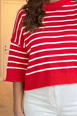 white pullover sweater featuring dropped shoulder and striped