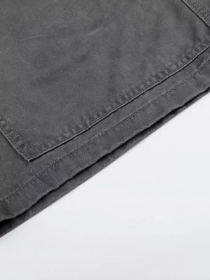 Men's grey cotton cargo capris with visible stitching detail on pocket.
