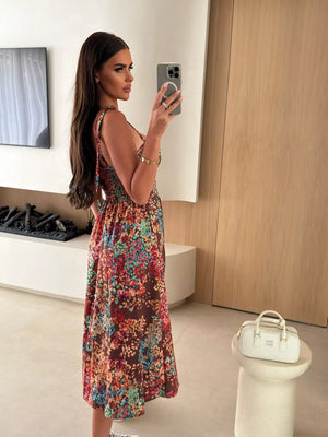 Floral tie-strap midi dress in brown with a multicolor floral print, A-line skirt.
