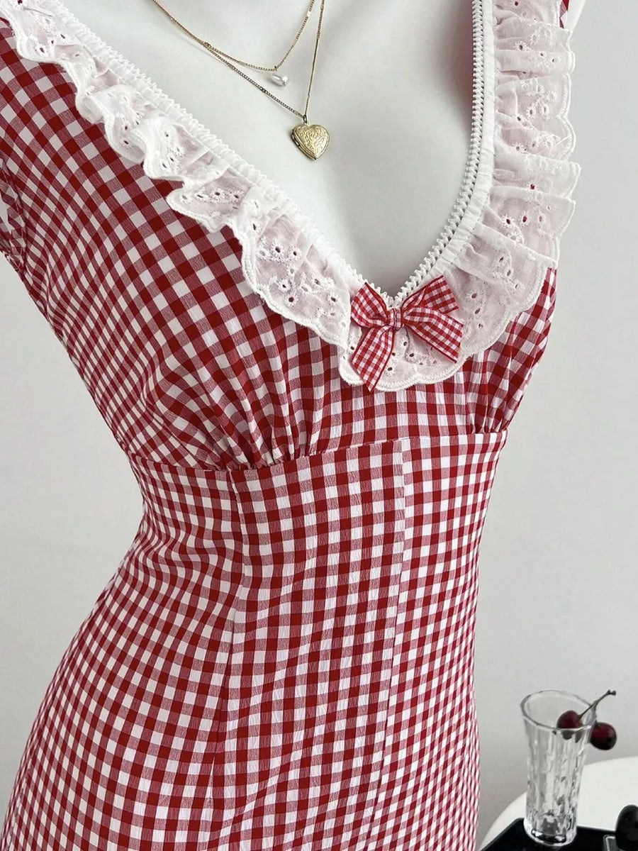 white romper featuring ruffled and gingham