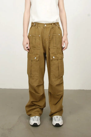 Khaki cargo trousers with multiple pockets and a wide-leg fit.