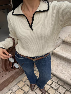 100% polyester Care instructions: Machine wash cold pullover sweater in cream with relaxed silhouette