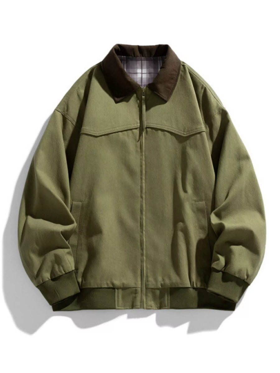Oversized olive green zip-up jacket with brown collar and plaid lining.