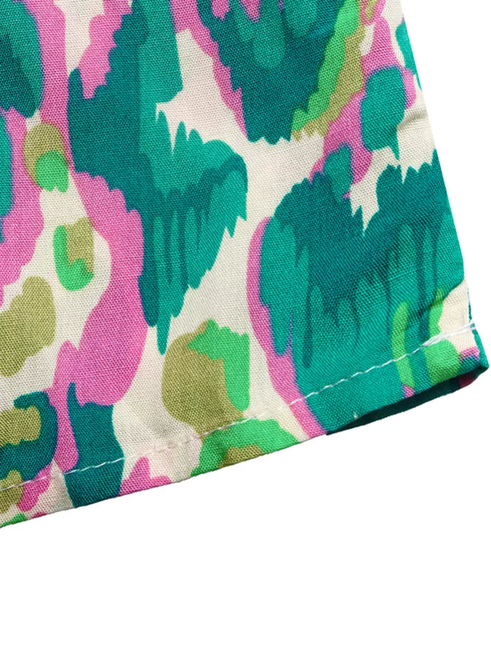 Maternity maxi dress with abstract print in pink, green, and cream.