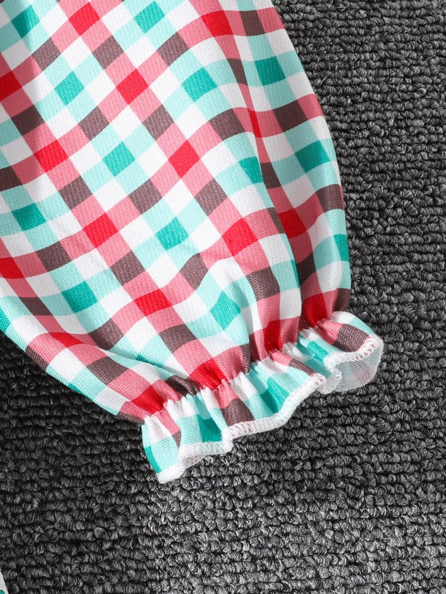 Festive plaid dress sleeve with ruffled cuff in multicolor.