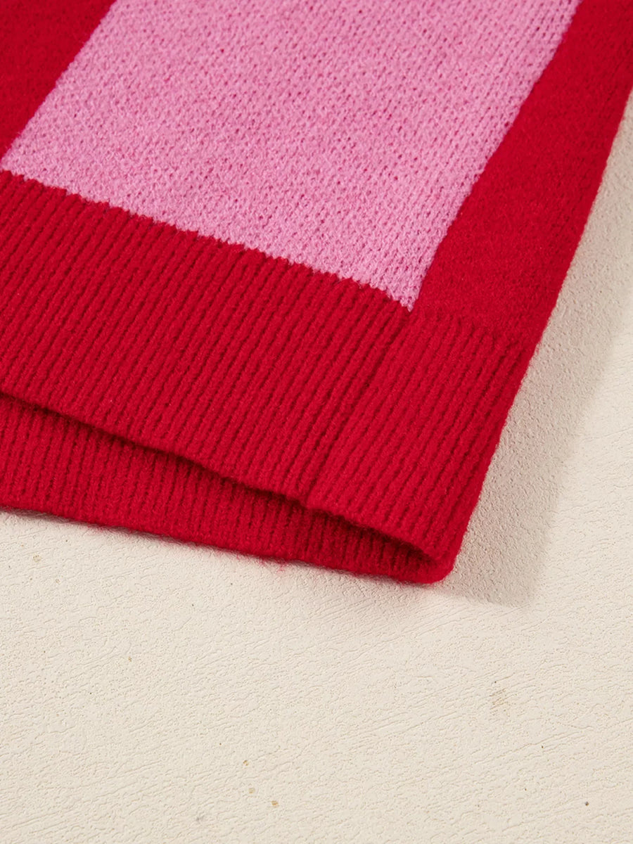 Checkerboard knit cardigan in deep rose and pink with ribbed hem detail.
