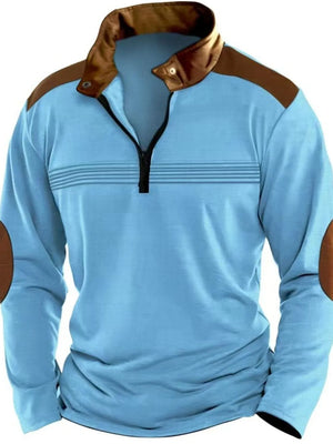 Light blue quarter-zip pullover with brown contrast panels, collar, and elbow patches.