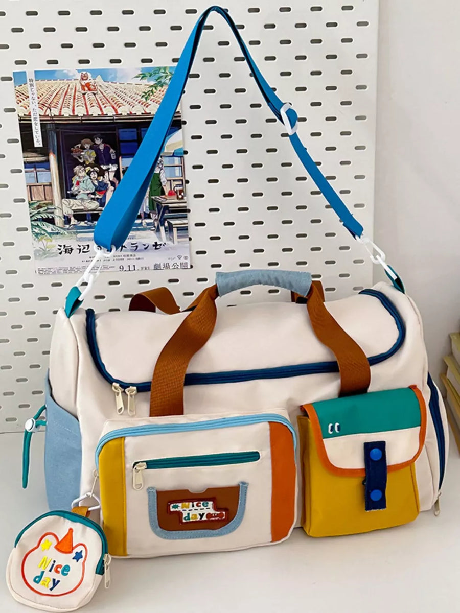 Vibrant multi-pocket nylon travel bag with color block details and a cute coin pouch.