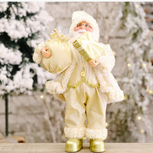 Festive Santa figurine in light yellow with gold trim, holding gift bags and presents.