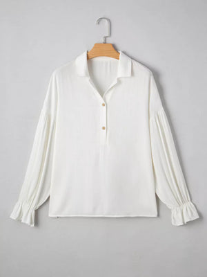White long sleeve peasant blouse with ruffled cuffs and button detail