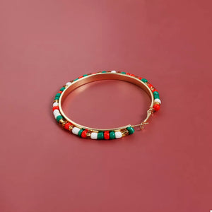 earrings featuring beaded in gold with 18K Gold-Plated, Alloy, Glass Care instructions: Avoid wearing during exercise