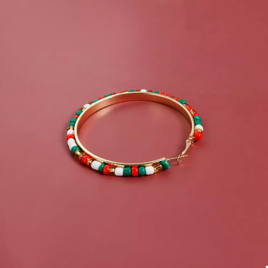 earrings featuring beaded in gold with 18K Gold-Plated, Alloy, Glass Care instructions: Avoid wearing during exercise