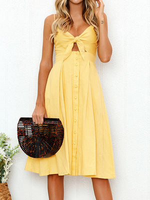 Yellow midi sundress with bow-front tie, button detail, and cami straps