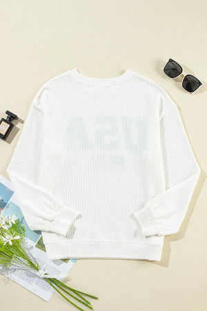 White ribbed knit sweatshirt with USA graphic detail and crew neck.