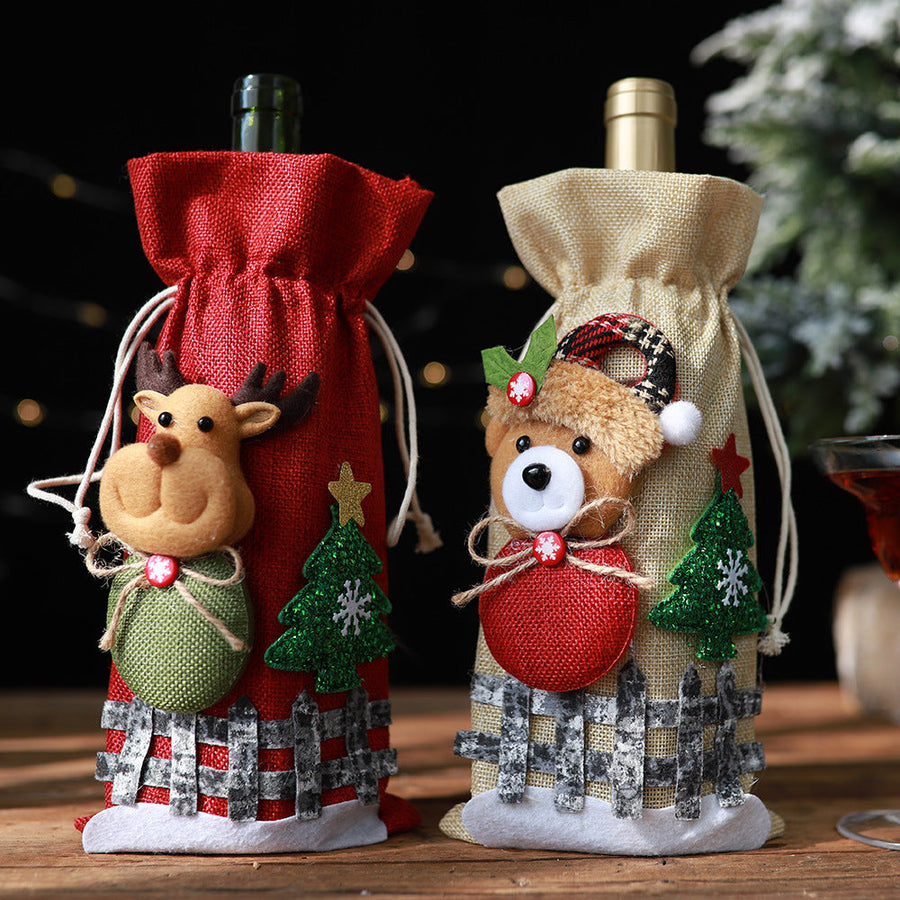 Festive wine gift bags with reindeer and bear characters, red and tan colors.