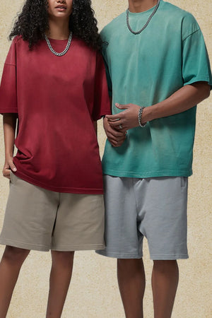 Oversized washed tee in burgundy and teal with relaxed fit and crew neck.