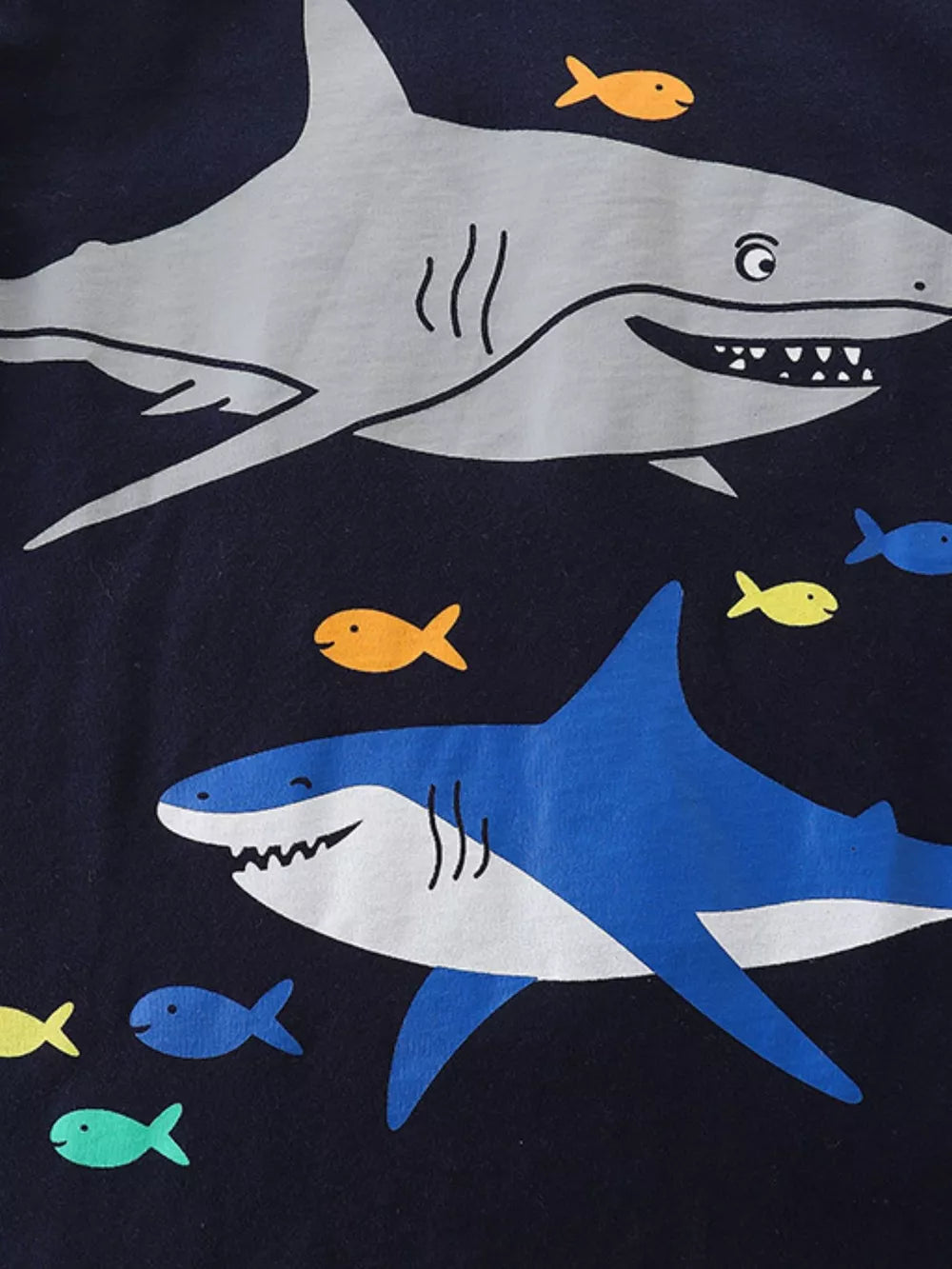 Toddler navy cotton tee with a playful shark and fish graphic print.