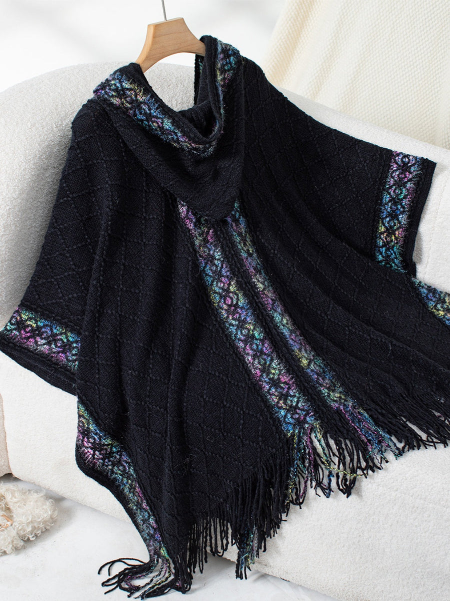 Black knit hooded wrap with embroidered trim and fringe detail