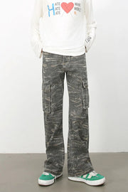 Distressed camo wide-leg cargo jeans in dark gray with multiple pockets.