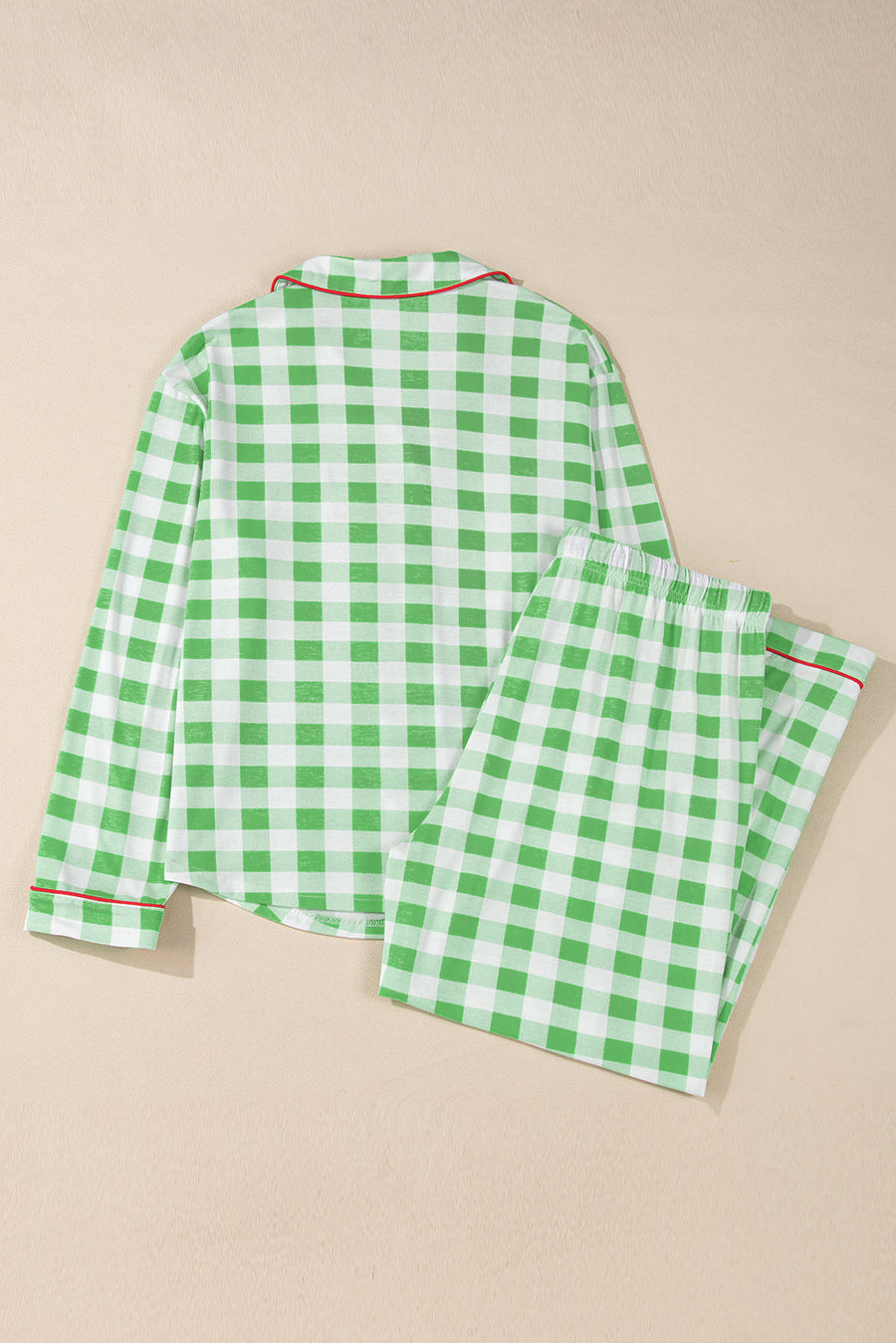 Light green gingham pajama set with red trim, collared long sleeve top and pants