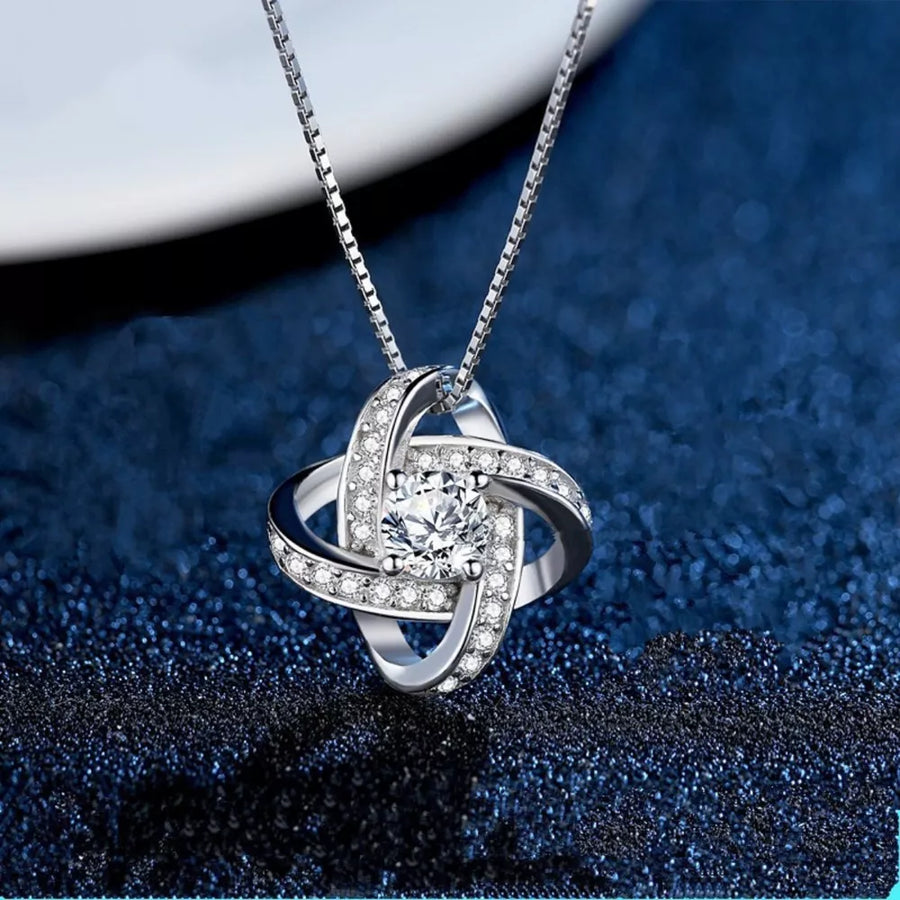 925 sterling silver,Moissanite Carat weight: 1ct Care instructions: Avoid wearin necklace in clear with fitted silhouette