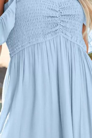 Light blue off-shoulder maxi dress with ruched bodice and flowy skirt
