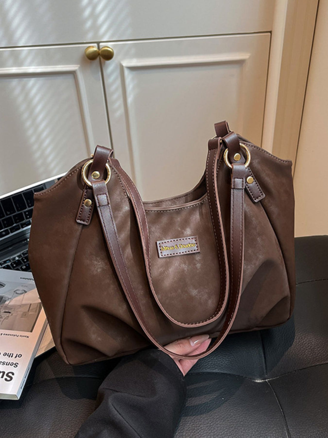 dark brown handbag