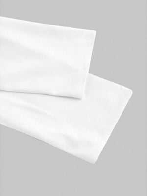 White asymmetrical long-sleeve shirt with button front detail