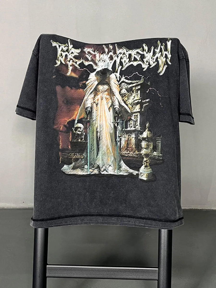 Black vintage wash graphic tee with a gothic illustration and text.