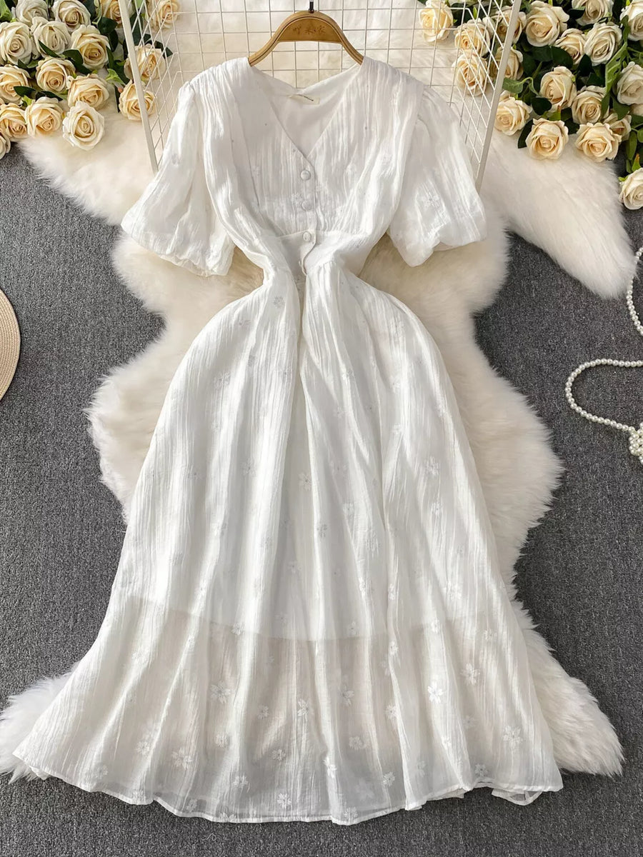 White embroidered puff sleeve midi dress with button front and A-line skirt