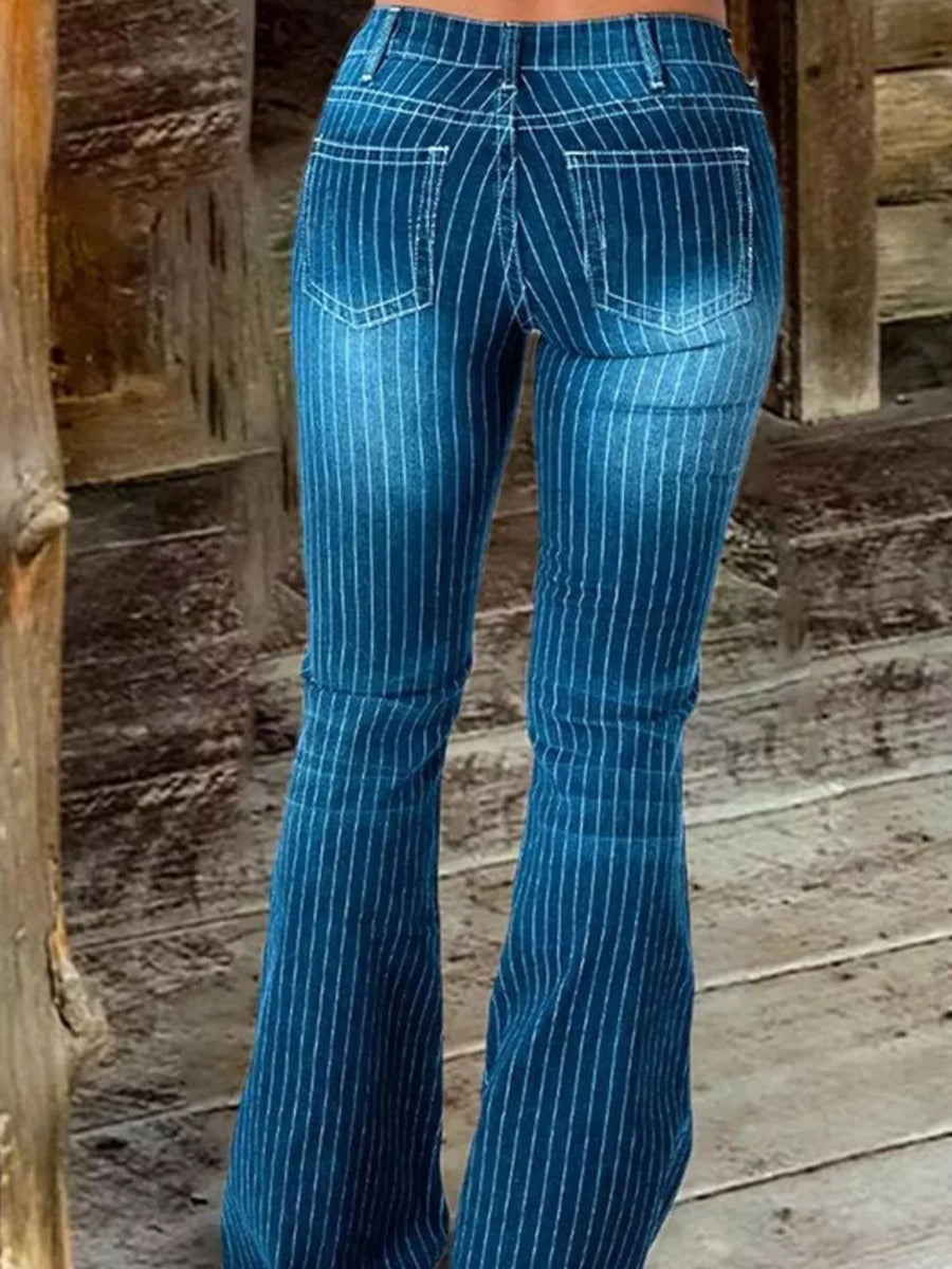 Blue denim maternity flare jeans with white vertical pinstripes and button fly.