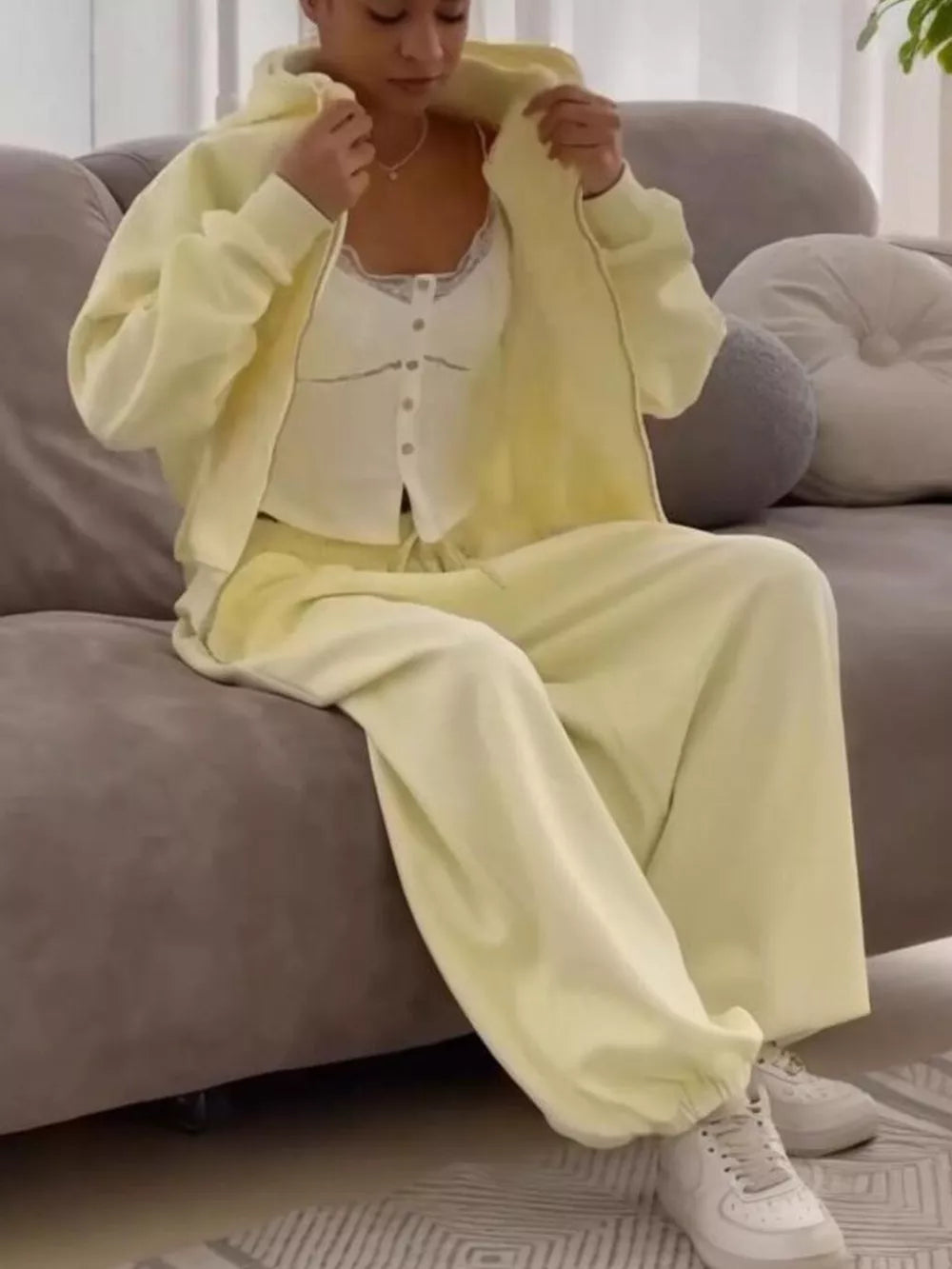 100% polyester Care instructions: Machine wash cold lounge set in pale yellow with oversized silhouette