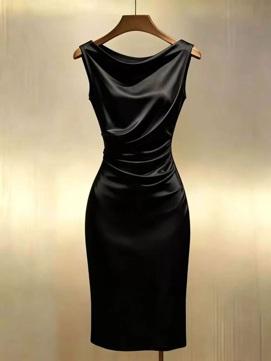 Black satin cowl neck dress with ruched side detail and bodycon fit.