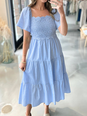 Blue cotton blend midi dress with lace bodice and puffed sleeves