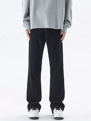 Black relaxed fit cotton jeans for men with a straight leg cut.