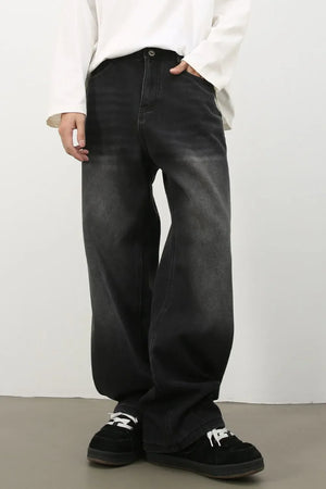 Oversized fade wash denim trousers in dark, wide leg casual jeans.