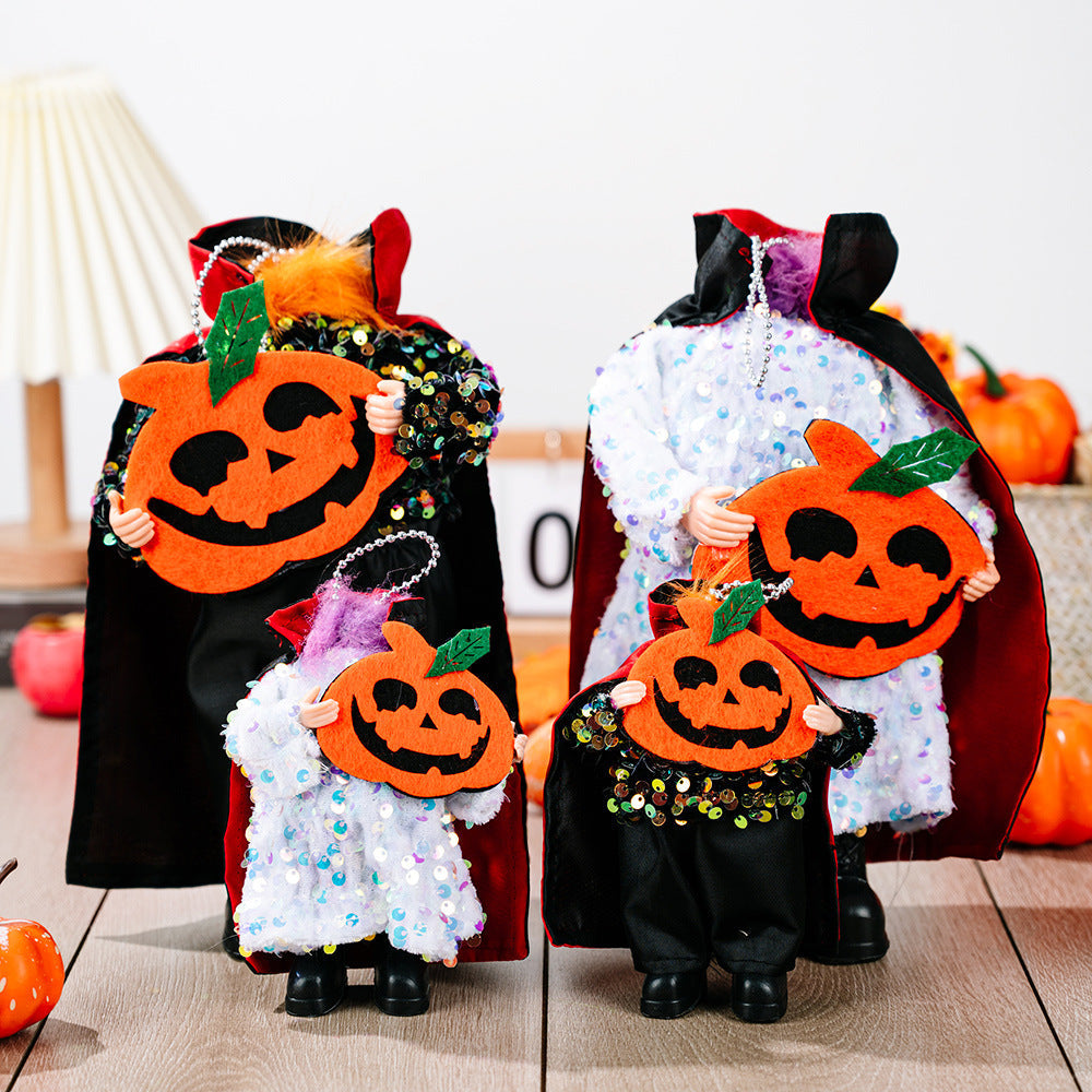 Halloween dolls in sequin capes and pumpkin cutouts, available in black and white.