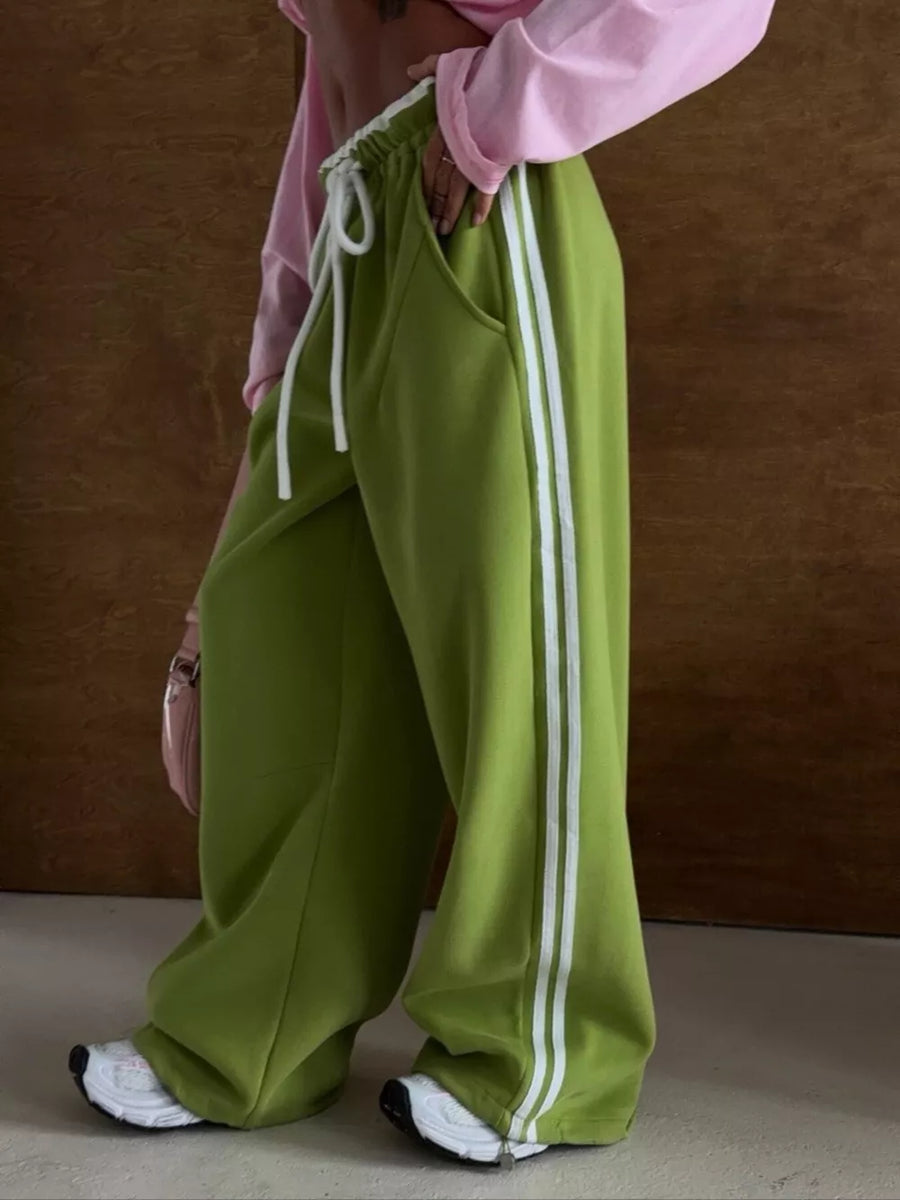 sweatpants featuring striped in Green with 100% polyester Care instructions: Machine wash cold texture
