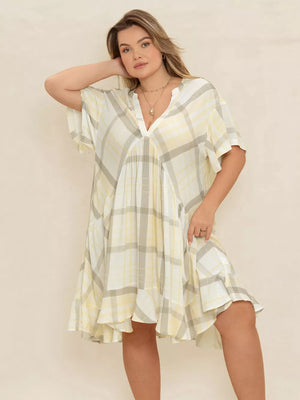 Plus size beige plaid flutter sleeve midi dress with V-neck and tiered skirt.