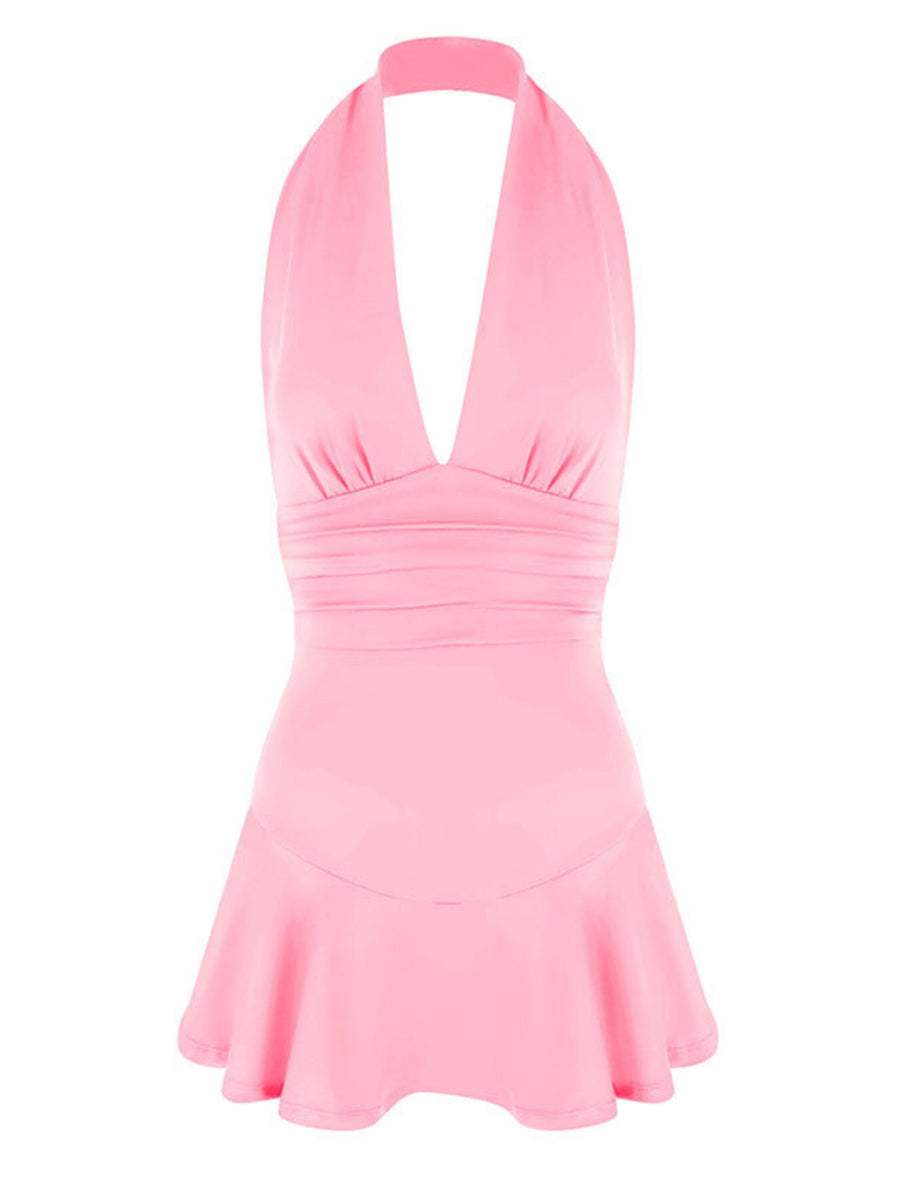 Pink halter dress with plunging V-neck, ruched waist, and ruffle hem