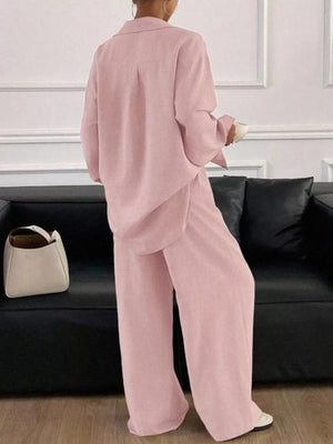 Black two-piece set with hip-length and button-front